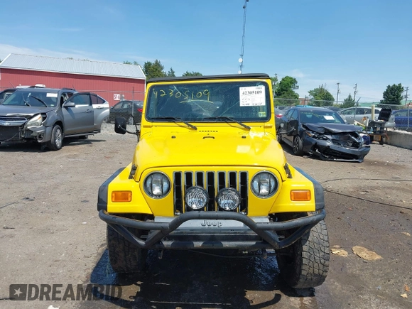 2005 Jeep Wrangler Sport with VIN 1J4FA49S65P381798, listed as a IAAI auction lot 42305109 with 71,880 mi miles and . Bid and sale history available at DreamBid. Image 12.