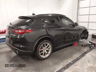 2019 Alfa Romeo Stelvio Ti with VIN ZASPAKBN3K7C71569, listed as a IAAI auction lot 41556814 with 87,279 mi miles and . Bid and sale history available at DreamBid. Image 4.