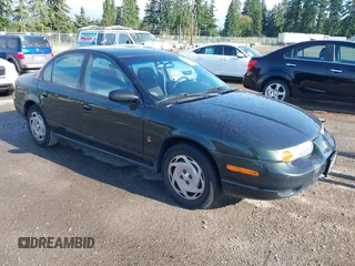 2000 Saturn SL z VIN 1G8ZK5271YZ165467, wystawiony jako IAAI lot #42367156 z przebiegiem 185 962 mil mil oraz . Historia ofert i sprzedaży dostępna na DreamBid. Obrazek 1.