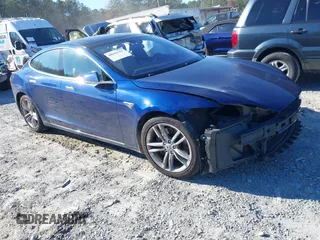 2016 Tesla Model S 90D with VIN 5YJSA1E25GF144614, listed as a IAAI auction lot 40941311 with 83,587 mi miles and . Bid and sale history available at DreamBid. Image 1.