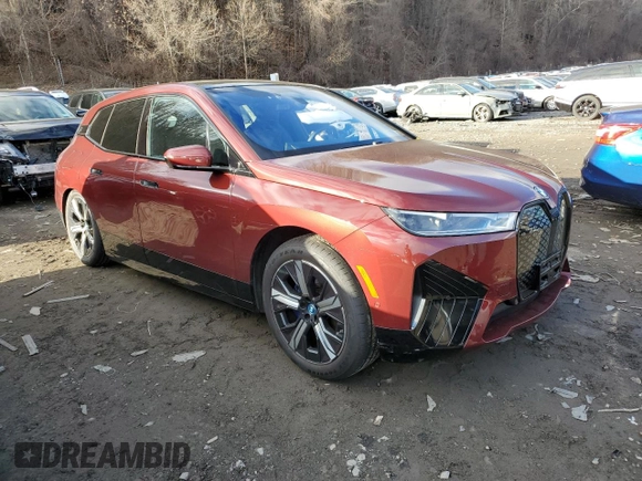 2022 BMW iX xDrive50 with VIN WB523CF05NCK56452, listed as a Copart auction lot 82352873 with 28,965 mi miles. Bid and sale history available at carsss.com. Image 4.