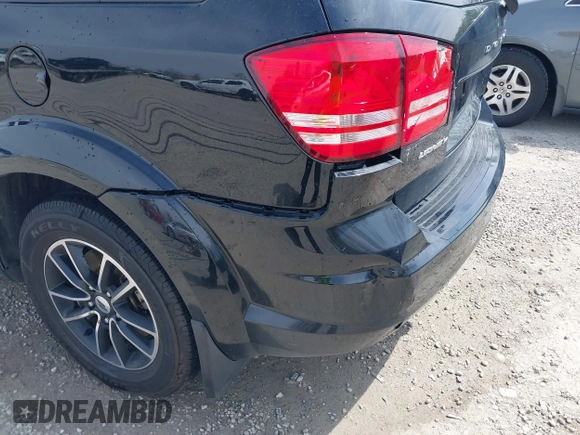2018 Dodge Journey SE with VIN 3C4PDCAB7JT529454, listed as a IAAI auction lot 42066676 with 89,404 mi miles and . Bid and sale history available at carsss.com. Image 18.