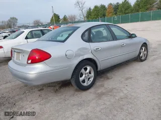 2003 Ford Taurus SES Standard with VIN 1FAFP55203A177634, listed as a IAAI auction lot 41804419 with 72,863 mi miles. Bid and sale history available at carsss.com. Image 4.