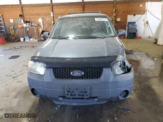 2006 Ford Escape XLS with VIN 1FMYU92Z56KA23659, listed as a Copart auction lot 76896374 with 0 mi miles and Salvage Title. Bid and sale history available at carsss.com. Image 5.