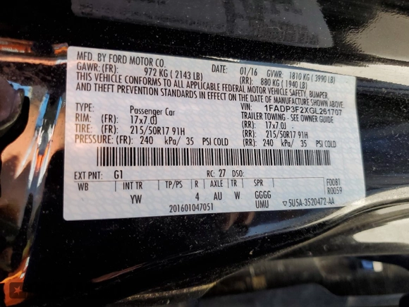 2016 Ford Focus SE z VIN 1FADP3F2XGL261707, wystawiony jako Copart lot #59078565 z przebiegiem 79 820 mil mil oraz Szkoda całkowita • Salvage title. Historia ofert i sprzedaży dostępna na DreamBid. Obrazek 13.