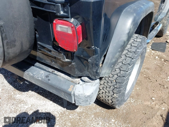 2000 Jeep Wrangler Sport with VIN 1J4FA49S8YP749547, listed as a IAAI auction lot 41861030 with 110,186 mi miles and . Bid and sale history available at DreamBid. Image 6.