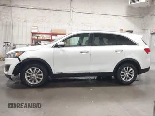 2016 Kia Sorento LX with VIN 5XYPGDA51GG047781, listed as a IAAI auction lot 42137935 with 103,386 mi miles. Bid and sale history available at carsss.com. Image 14.
