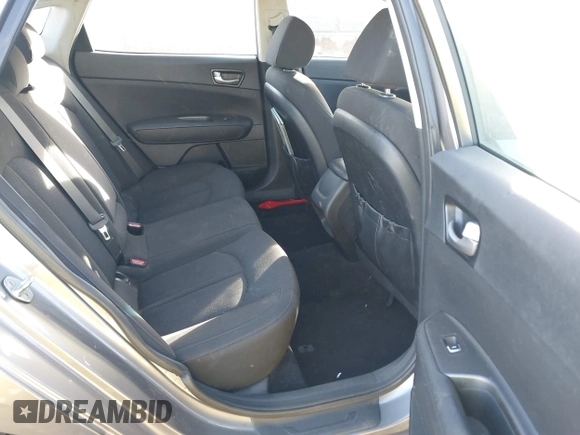 2018 Kia Optima LX with VIN 5XXGT4L32JG256921, listed as a IAAI auction lot 41389850 with 91,013 mi miles and . Bid and sale history available at DreamBid. Image 8.