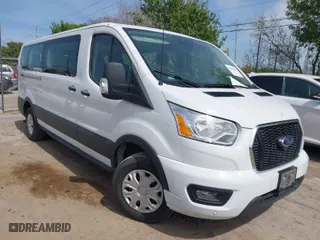2022 Ford Transit Passenger Wagon XL with VIN 1FBAX2Y81NKA44210, listed as a IAAI auction lot 41878018 with 60,867 mi miles. Bid and sale history available at carsss.com. Image 1.