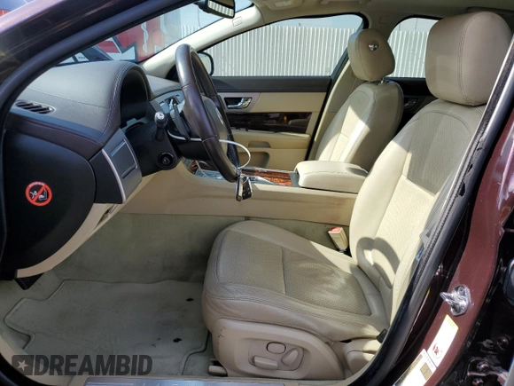 2011 Jaguar XF Premium with VIN SAJWA0GB1BLS08325, listed as a Copart auction lot 61190335 with 61,656 mi miles and Salvage title. Bid and sale history available at DreamBid. Image 7.