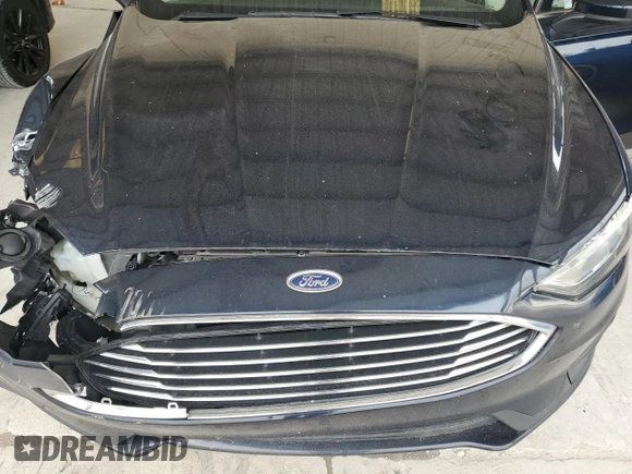 2020 Ford Fusion SE с VIN 3FA6P0HD5LR161189, выставлен на аукционе Copart как лот 62369585 с пробегом 100 440 миль миль и Списание • Salvage title. История ставок и продаж доступна на DreamBid. Изображение 11.