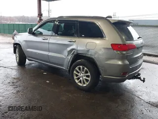 2014 Jeep Grand Cherokee Laredo with VIN 1C4RJFAG4EC156549, listed as a IAAI auction lot 41904814 with 139,262 mi miles. Bid and sale history available at carsss.com. Image 3.