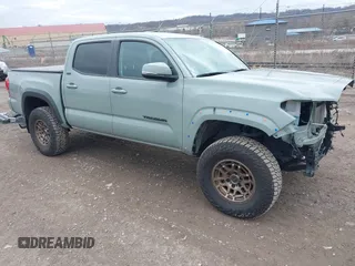 2022 Toyota Tacoma SR with VIN 3TMCZ5AN9NM508269, listed as a IAAI auction lot 41785970 with 36,442 mi miles and . Bid and sale history available at DreamBid. Image 1.