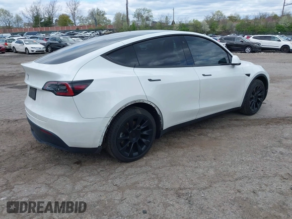 2022 Tesla Model Y Long Range z VIN 7SAYGDEE7NF385207, wystawiony jako IAAI lot #42054449 z przebiegiem 52 834 mil mil oraz . Historia ofert i sprzedaży dostępna na DreamBid. Obrazek 4.