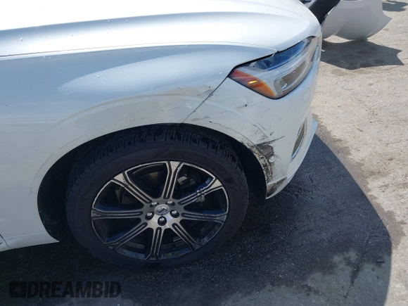 2019 Volvo XC60 Inscription z VIN LYV102RL9KB284828, wystawiony jako IAAI lot #41925864 z przebiegiem 94 394 mil mil oraz . Historia ofert i sprzedaży dostępna na DreamBid. Obrazek 17.