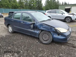 2002 Ford Focus LX with VIN 1FAFP33P12W113185, listed as a Copart auction lot 48554805 with 117,769 mi miles and Salvage Title. Bid and sale history available at DreamBid. Image 4.