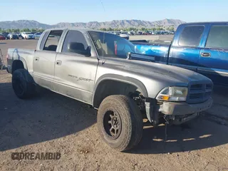 2002 Dodge Dakota with VIN 1B7HG38Z62S553505, listed as a IAAI auction lot 42499787 with Not provided miles and . Bid and sale history available at DreamBid. Image 1.