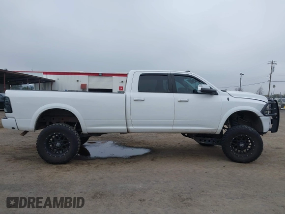 2014 Ram 2500 with VIN 3C6TR5KT3EG309771, listed as a IAAI auction lot 41213964 with 136,617 mi miles and . Bid and sale history available at DreamBid. Image 14.