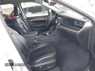 2023 Jeep Grand Cherokee with VIN 1C4RJYB60PC650900, listed as a IAAI auction lot 41773825 with 19,243 mi miles and . Bid and sale history available at DreamBid. Image 5.