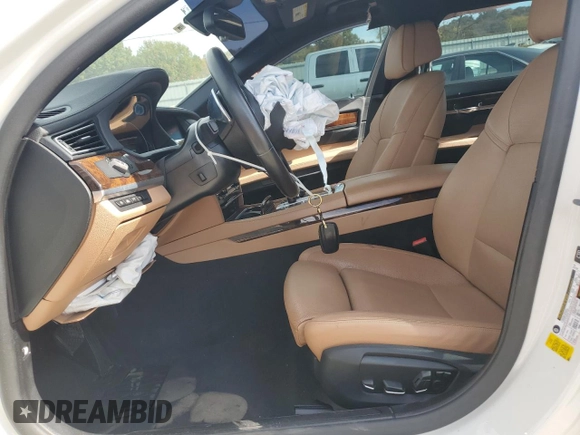 2015 BMW 7 Series 740Li with VIN WBAYE4C50FD138994, listed as a Copart auction lot 73342663 with 102,711 mi miles and . Bid and sale history available at DreamBid. Image 7.