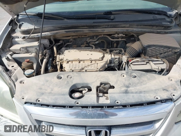 2005 Honda Odyssey TOURING with VIN 5FNRL38895B060605, listed as a IAAI auction lot 41809330 with 228,487 mi miles. Bid and sale history available at carsss.com. Image 10.