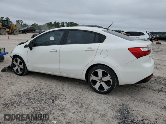 2015 Kia Rio EX with VIN KNADN4A32F6424365, listed as a Copart auction lot 70862234 with 87,586 mi miles and Salvage Title. Bid and sale history available at carsss.com. Image 2.