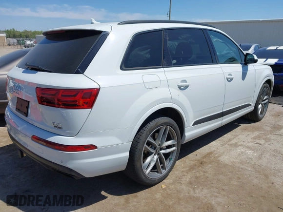 2018 Audi Q7 Prestige with VIN WA1VAAF74JD036128, listed as a IAAI auction lot 42038586 with 96,167 mi miles and . Bid and sale history available at DreamBid. Image 4.
