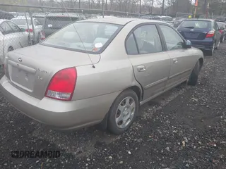 2001 Hyundai Elantra GLS z VIN KMHDN45D71U080537, wystawiony jako IAAI lot #42095959 z przebiegiem Nie podano mil oraz . Historia ofert i sprzedaży dostępna na DreamBid. Obrazek 4.