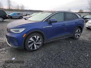 2021 Volkswagen ID.4 Pro S z VIN WVGKMPE27MP058308, wystawiony jako Copart lot #49283695 z przebiegiem Nie podano mil oraz Szkody całkowita. Historia ofert i sprzedaży dostępna na DreamBid. Obrazek 1.