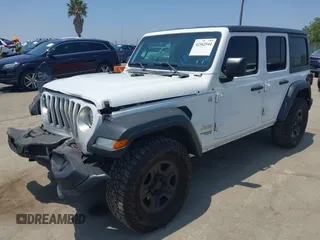 2018 Jeep Wrangler Unlimited Sport S with VIN 1C4HJXDN7JW232530, listed as a IAAI auction lot 42362544 with 89,972 mi miles and . Bid and sale history available at DreamBid. Image 2.
