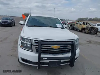 2020 Chevrolet Tahoe Commercial with VIN 1GNSKDEC9LR260983, listed as a IAAI auction lot 42062097 with 124,911 mi miles. Bid and sale history available at carsss.com. Image 6.