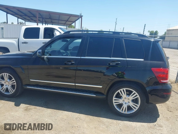 2013 Mercedes-Benz GLK with VIN WDCGG8JBXDG051067, listed as a IAAI auction lot 42107151 with 123,576 mi miles. Bid and sale history available at carsss.com. Image 15.