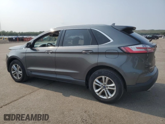 2019 Ford Edge SEL z VIN 2FMPK4J9XKBC67141, wystawiony jako Copart lot #60271615 z przebiegiem 100 400 mil mil oraz Szkoda całkowita • Salvage title. Historia ofert i sprzedaży dostępna na DreamBid. Obrazek 2.
