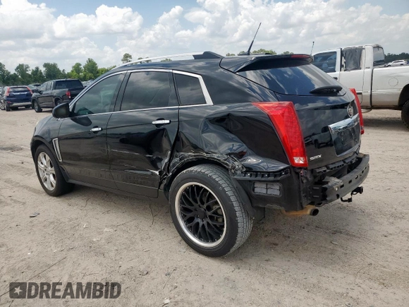 2013 Cadillac SRX Performance Collection with VIN 3GYFNDE31DS569809, listed as a Copart auction lot 60332445 with 222,167 mi miles and Salvage title. Bid and sale history available at DreamBid. Image 2.
