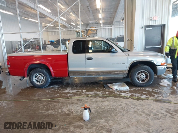 1998 Dodge Dakota SLT z VIN 1B7GL22YXWS762222, wystawiony jako IAAI lot #41250956 z przebiegiem 195 027 mil mil oraz . Historia ofert i sprzedaży dostępna na DreamBid. Obrazek 13.