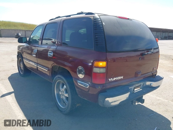 2001 GMC Yukon SLT with VIN 1GKEK13V81J100005, listed as a IAAI auction lot 42090494 with 276,042 mi miles. Bid and sale history available at carsss.com. Image 3.