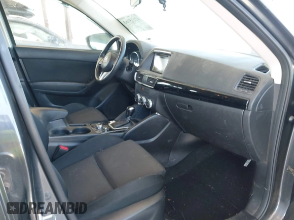 2016 Mazda CX-5 Sport with VIN JM3KE4BY1G0910102, listed as a IAAI auction lot 42115163 with 144,495 mi miles and . Bid and sale history available at carsss.com. Image 5.