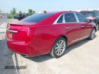 2013 Cadillac XTS Luxury z VIN 2G61P5S34D9139924, wystawiony jako IAAI lot #42504191 z przebiegiem 140 744 mil mil oraz . Historia ofert i sprzedaży dostępna na DreamBid. Obrazek 4.