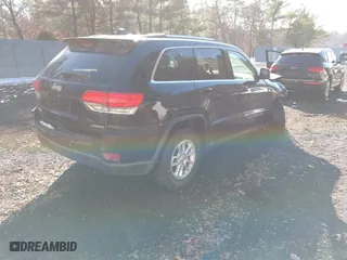 2018 Jeep Grand Cherokee Laredo E with VIN 1C4RJFAG4JC326631, listed as a IAAI auction lot 41191061 with 115,451 mi miles. Bid and sale history available at carsss.com. Image 4.