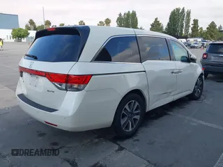 2015 Honda Odyssey Touring Elite with VIN 5FNRL5H9XFB102222, listed as a IAAI auction lot 42485059 with 123,562 mi miles and . Bid and sale history available at DreamBid. Image 4.