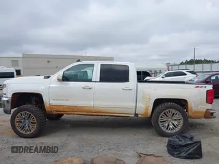 2017 Chevrolet Silverado 1500 LT with VIN 3GCUKREC7HG100199, listed as a IAAI auction lot 41542046 with 224,692 mi miles and . Bid and sale history available at DreamBid. Image 14.
