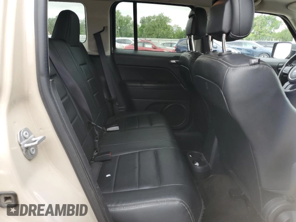 2017 Jeep Patriot High Altitude with VIN 1C4NJRFB3HD162483, listed as a Copart auction lot 58160515 with 135,038 mi miles and Salvage title. Bid and sale history available at DreamBid. Image 11.