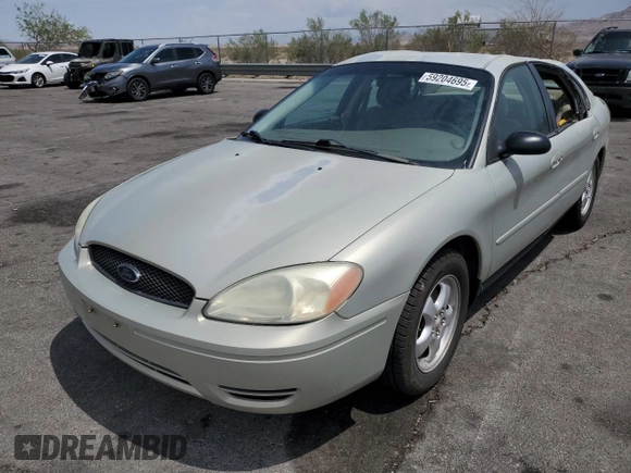 2007 Ford Taurus SE with VIN 1FAFP53U27A156844, listed as a Copart auction lot 59204695 with 157,633 mi miles and Salvage title. Bid and sale history available at DreamBid. Image 1.
