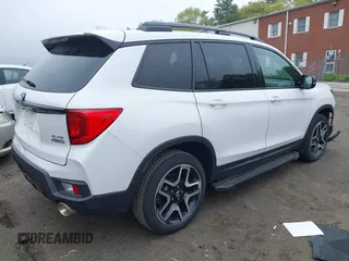 2023 Honda Passport Elite with VIN 5FNYF8H00PB022743, listed as a IAAI auction lot 42192958 with 25,165 mi miles and . Bid and sale history available at DreamBid. Image 4.