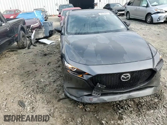 2019 Mazda 3 with VIN JM1BPAJMXK1119912, listed as a Copart auction lot 59708825 with 50,459 mi miles and Salvage title. Bid and sale history available at DreamBid. Image 14.