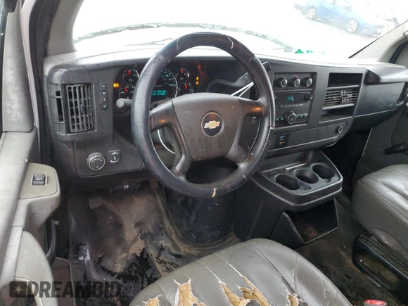 2012 Chevrolet Express Cargo z VIN 1GCWGFCAXC1165369, wystawiony jako Copart lot #60208784 z przebiegiem 199 099 mil mil oraz Szkoda całkowita • Salvage title. Historia ofert i sprzedaży dostępna na DreamBid. Obrazek 8.