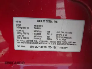 2020 Tesla Model Y Long Range z VIN 5YJYGDEE0LF034164, wystawiony jako IAAI lot #42080304 z przebiegiem 55 520 mil mil oraz . Historia ofert i sprzedaży dostępna na DreamBid. Obrazek 9.