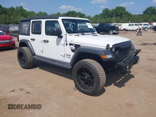 2018 Jeep Wrangler Unlimited Sport S with VIN 1C4HJXDG7JW150038, listed as a IAAI auction lot 42519194 with 113,300 mi miles and . Bid and sale history available at DreamBid. Image 1.