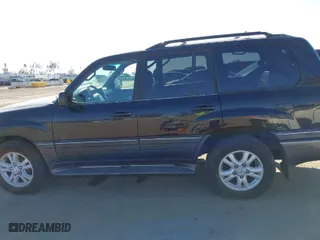 2004 Lexus LX 470 with VIN JTJHT00WX43543307, listed as a IAAI auction lot 41996860 with 211,652 mi miles. Bid and sale history available at carsss.com. Image 15.