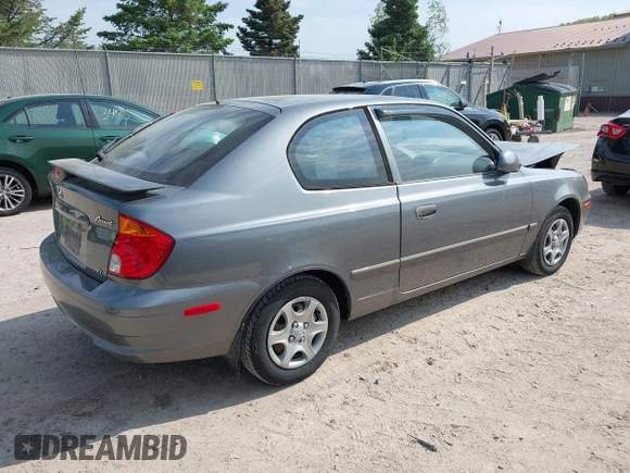 2003 Hyundai Accent GL z VIN KMHCG35CX3U243322, wystawiony jako IAAI lot #42277841 z przebiegiem 45 855 mil mil oraz . Historia ofert i sprzedaży dostępna na DreamBid. Obrazek 4.